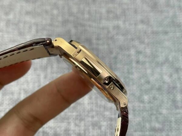 Patek Philippe Nautilus 5712 Moonphase Rose Gold Black Dial Watch - Image 5