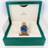 rolex everose gold sky dweller watch fluted ring command bezel blue green index dial oyster bracelet m336935 0001 3672 oemac.webp