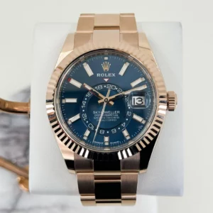 Rolex Everose Gold Sky-Dweller Watch  Fluted Ring Command Bezel  Blue-Green Index Dial  Oyster Bracelet M336935-0001