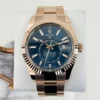 rolex everose gold sky dweller watch fluted ring command bezel blue green index dial oyster bracelet m336935 0001 9797 u6rwu.webp