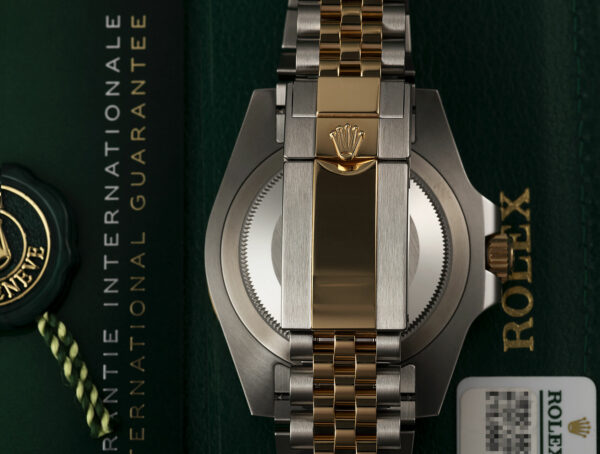 rolex gmt master ii m126713grnr 0001 oyster 40 mm oystersteel and yellow gold 6263 69cqu.jpg