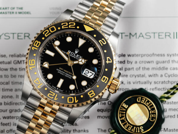 rolex gmt master ii m126713grnr 0001 oyster 40 mm oystersteel and yellow gold 6900 agyay.jpg